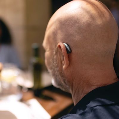 man wearing phonak hearing aid