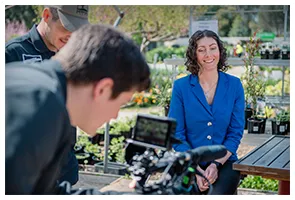 Directing an interview at a plant nursery