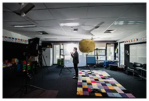Interview setup with a softbox in a classroom