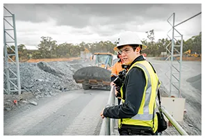 On location at a quarry in a hi-vis vest