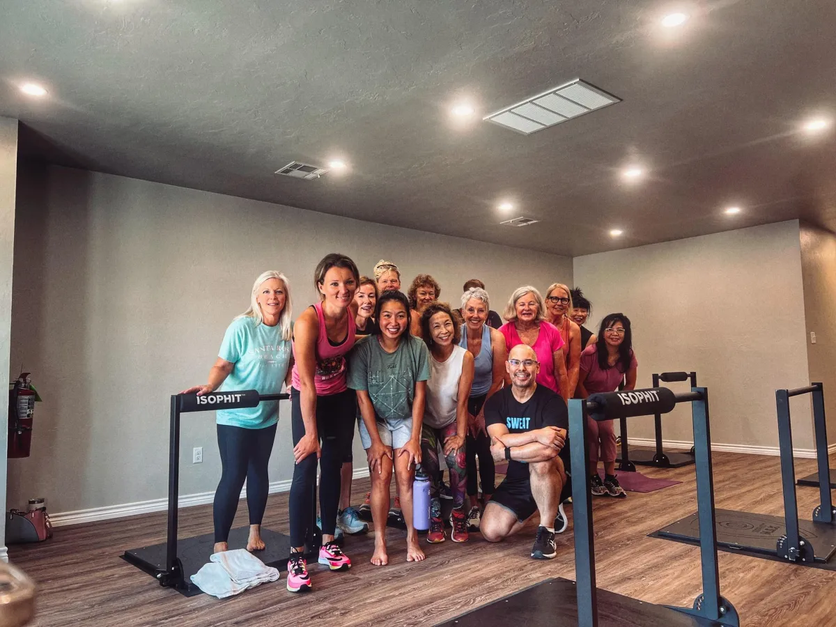 Our Gym Members with coach at Sweat Is Free in Moore
