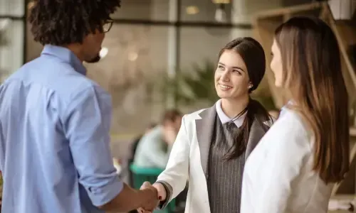 Friendly church staff member assisting a guest.