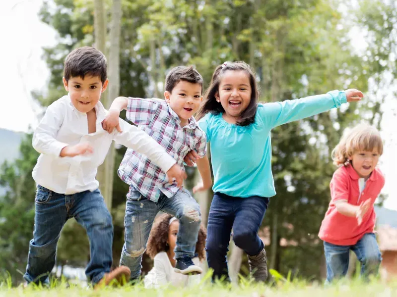 Children running and playing together during SPLASH Kids ministry at The Fountain Church Lawrenceville GA