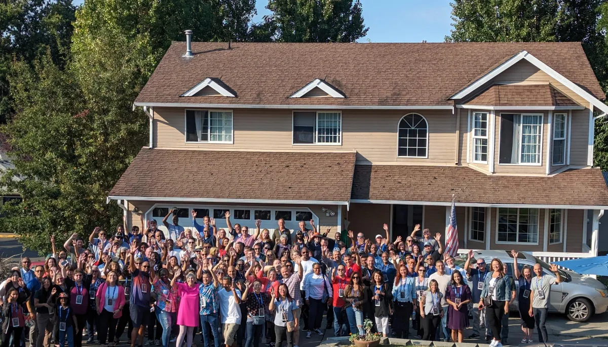 crowd of people at shared housing seminar