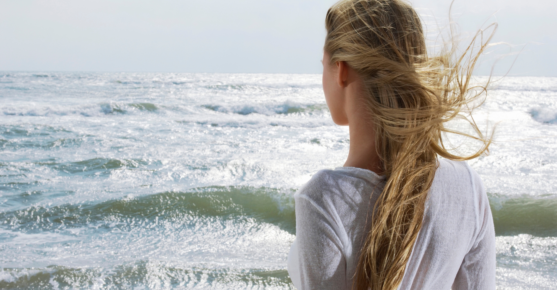 Meant for More Program Lifestyle Image showing  woman looking at the ocean in deep thought