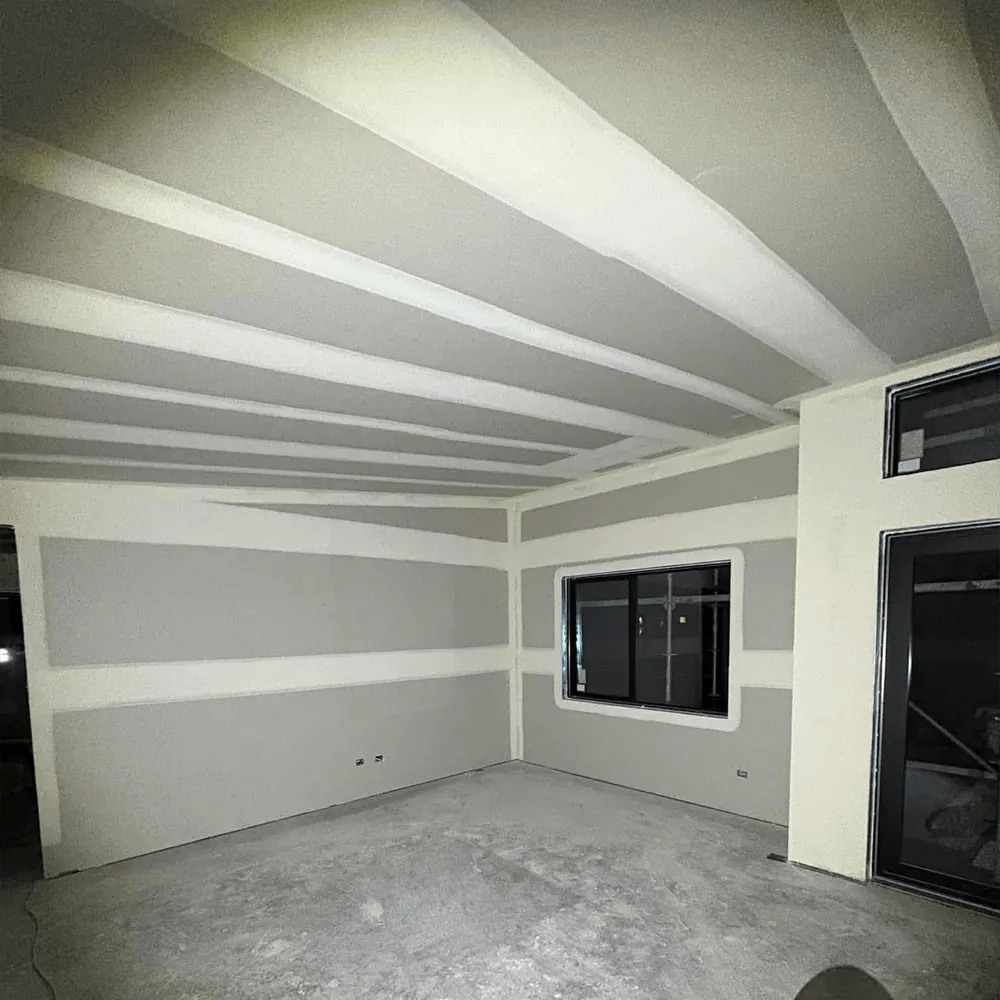 Renovation plastering blending old and new surfaces in Christchurch home