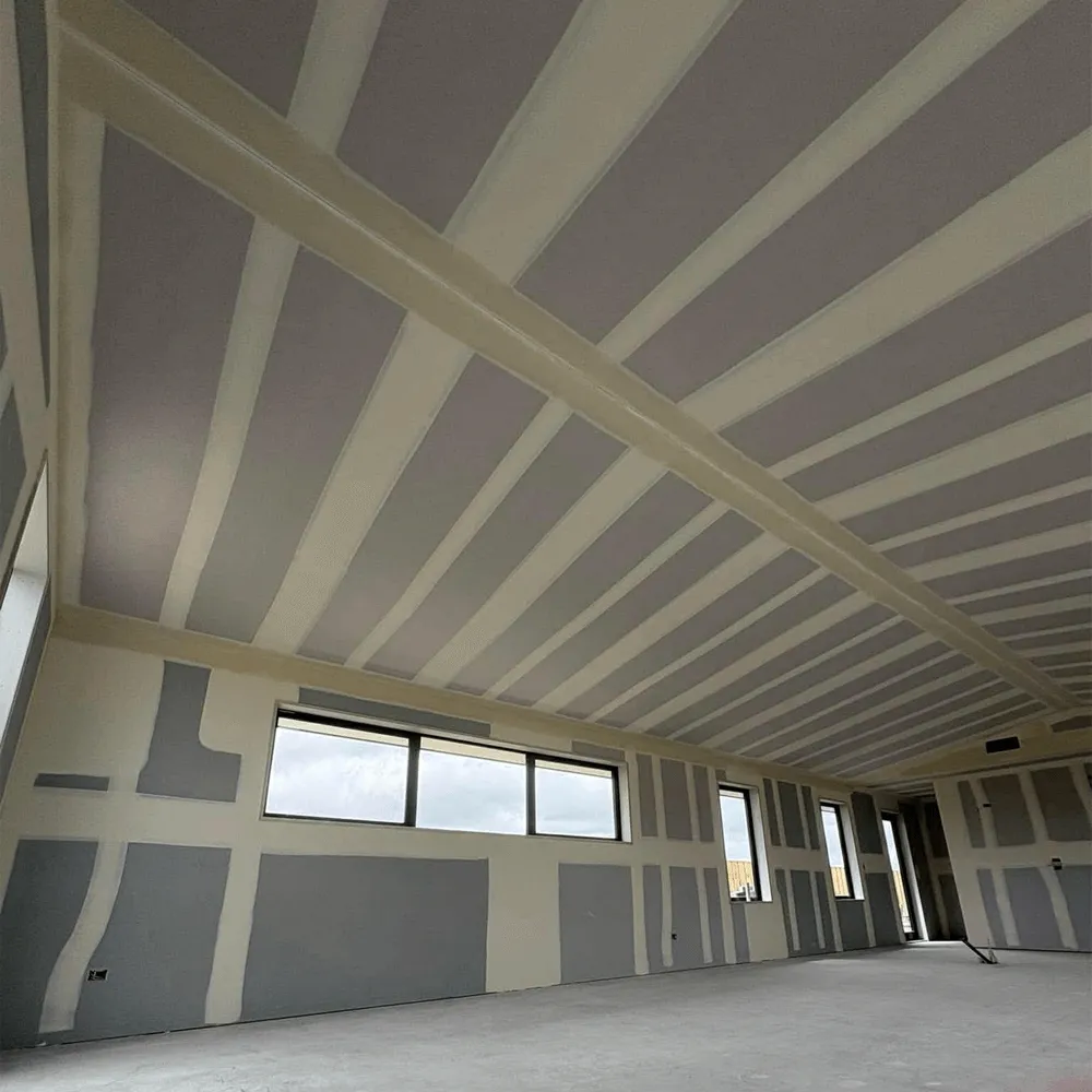 Level 4 and Level 5 finish on interior wall in Christchurch home