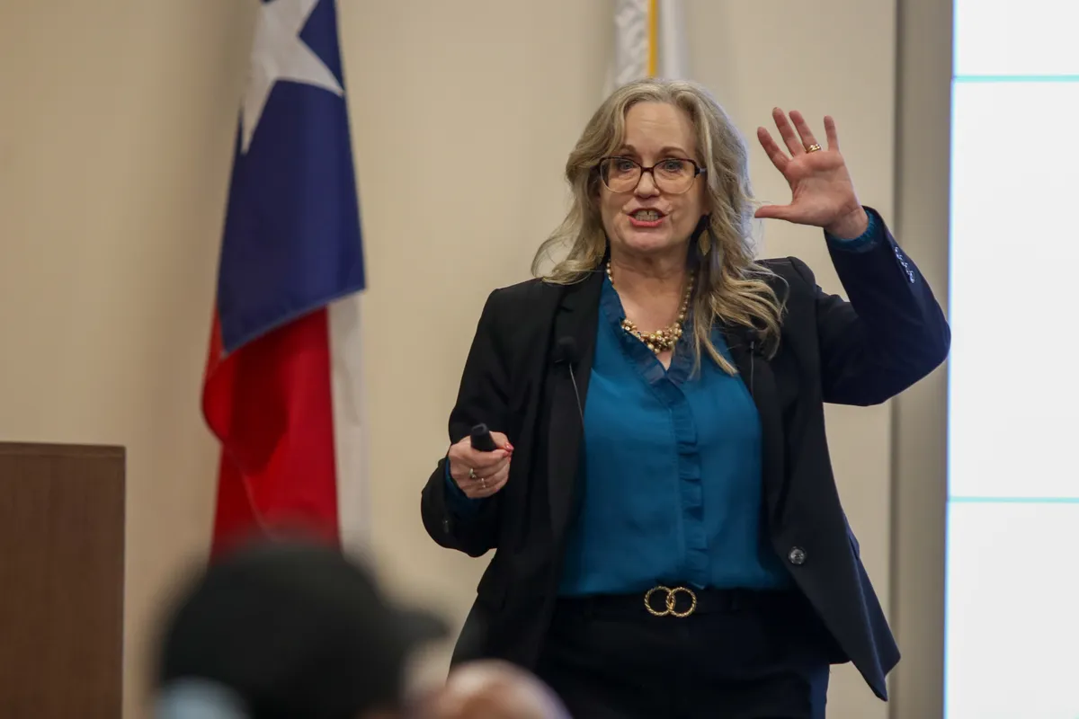 Dr. Arden Dudek speaking on executive leadership.