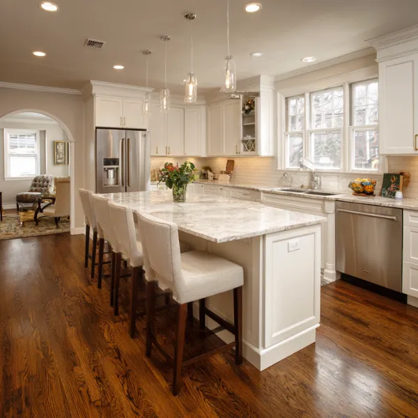 Modern single-family home featuring a sleek exterior, open floor plan, and custom design elements tailored for family living and functionality.
