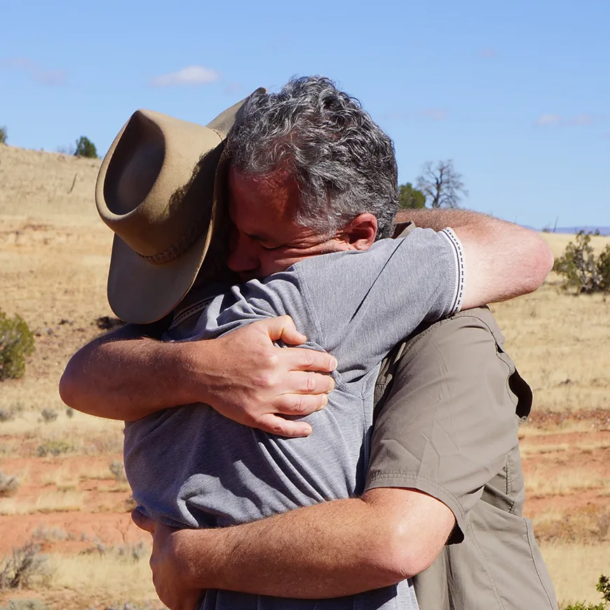 Warm Embrace - Two People Hugging