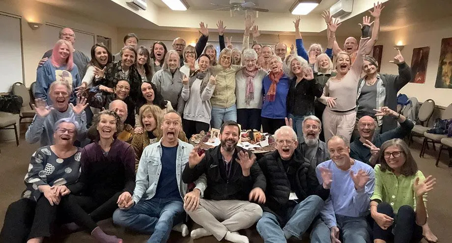 Group photo from the 2024 retreat in the USA - happy, confident & outrageous!