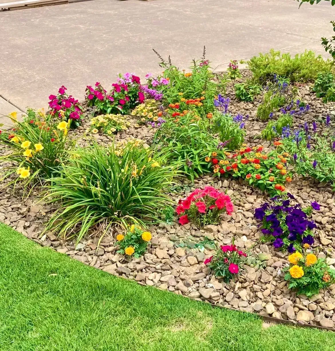 Colorful flower bed installed in Springdale, Arkansas by 5 Star Grounds