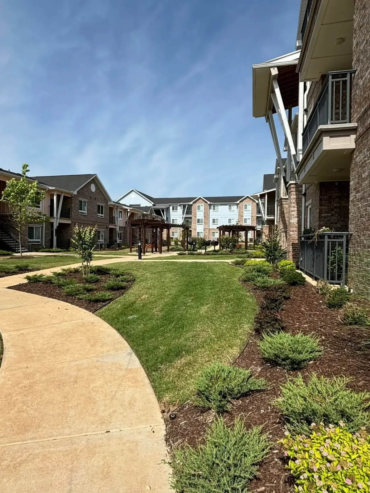 5 Star Grounds providing professional landscape maintenance for commercial property in Northwest Arkansas