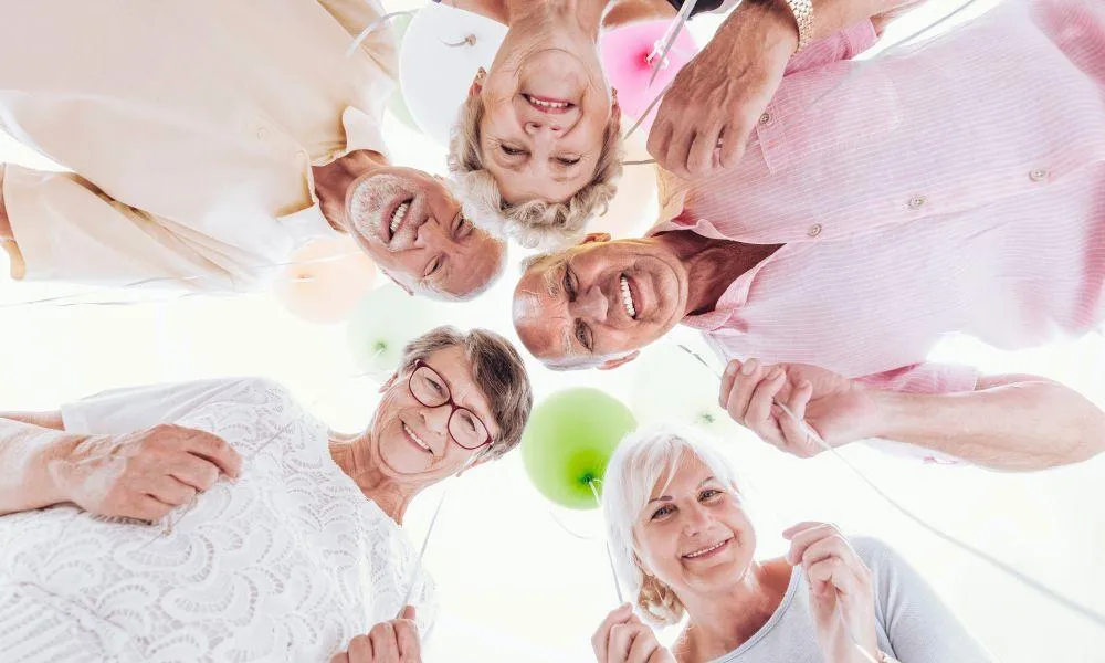 white concrete house near green palm tree during daytime