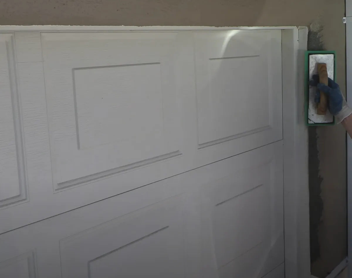 stucco repair on garage door