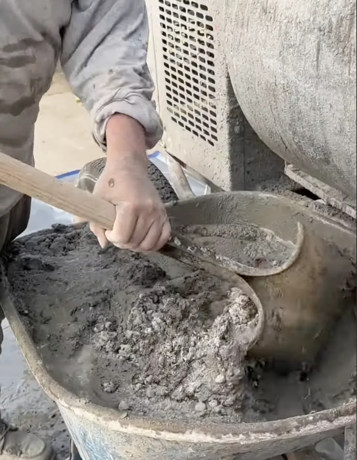 man mixing new stucco