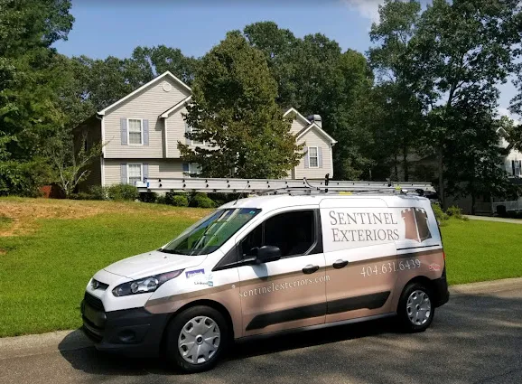 Roofers and More - Sentinel Exteriors Truck