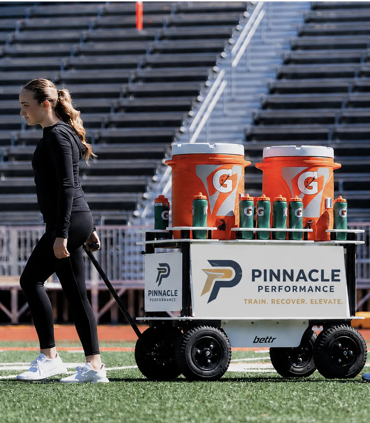 Premium school-branded hydration cart on the sideline with high visibility sponsor logos