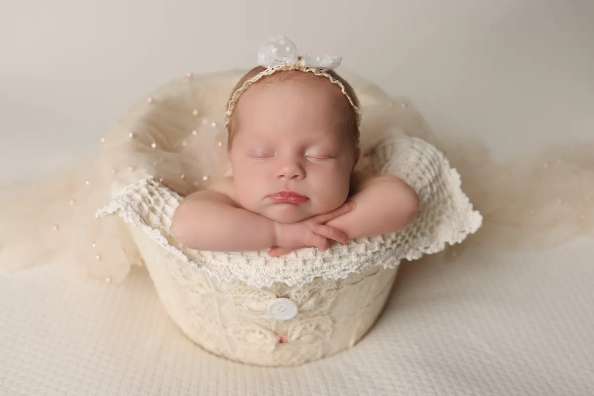 Photo of baby sleeping on its front , taken by Ipswich baby photographer