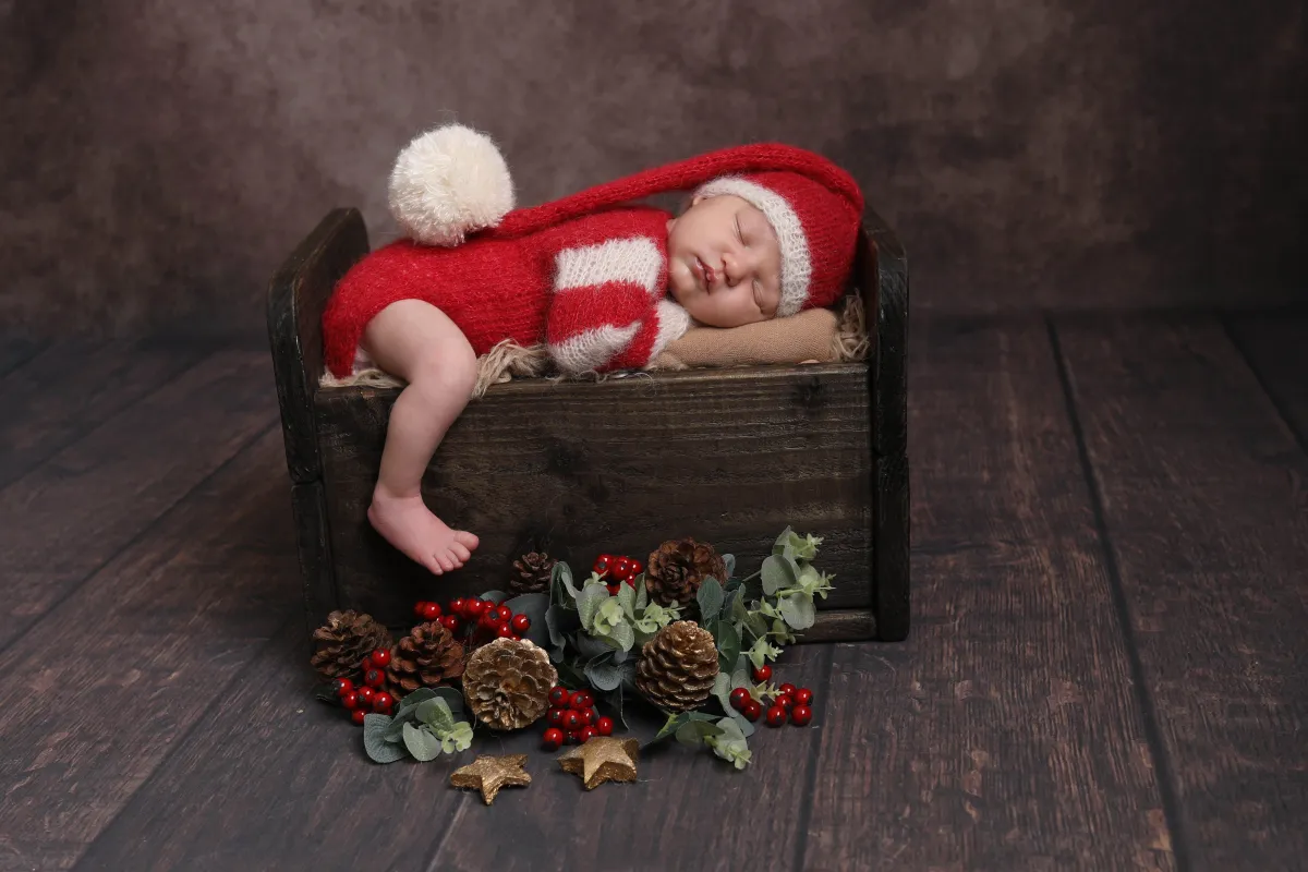 Sleeping baby on box - taken by professional photographer in Loughborough