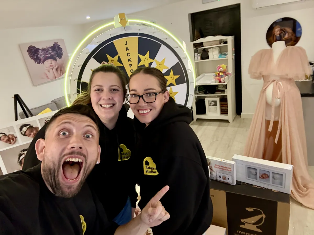 Promo image for Baby Art Studios' live giveaway featuring baby and family prizes worth over £50,000.