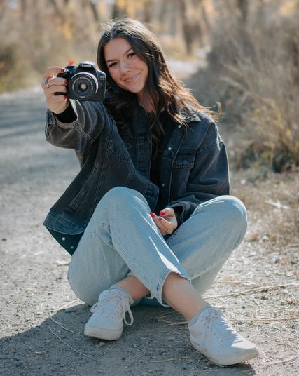 Brian and Michelle Cook with AI tools on iPad in background – Empowering Humans Digital Media
