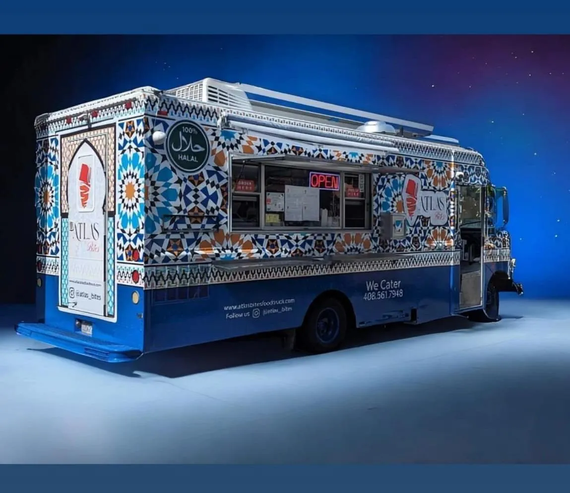 a table full of food and glasses of water