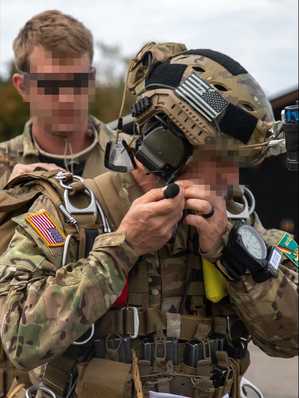 soldier putting on a helmet
