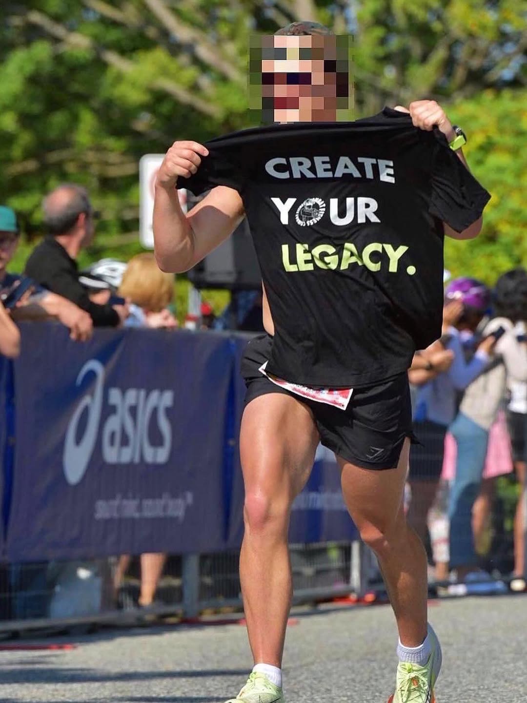 Runner finishing a road race, illustrating the limits of zone 2 aerobic training for tactical athletes.