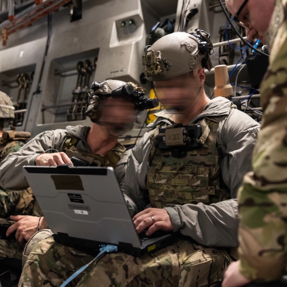 Special operations candidate performing max pull-ups during a UBRR test