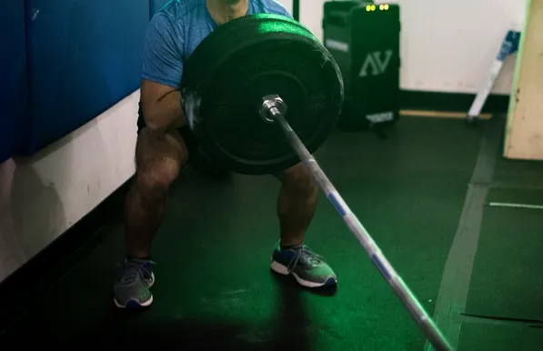 Landmine Squat: Form, 8 Variations & Muscles Worked