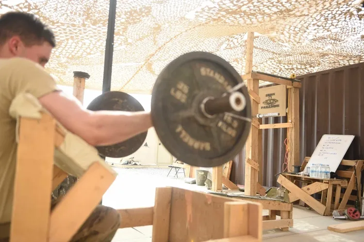 Dumbbell Preacher Curl: How to Do It Right | Combat Fitness