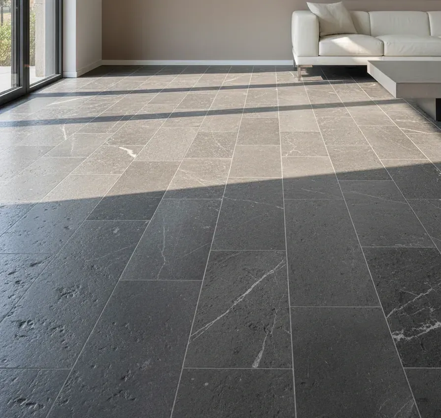 Dark grey porcelain tile flooring with subtle marble veining in a modern living room