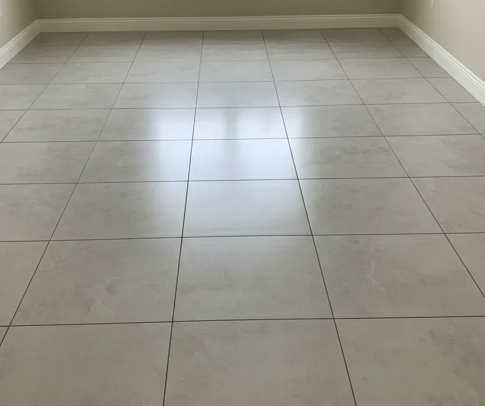 Light matte ceramic tile flooring with subtle stone texture – All Type Floors