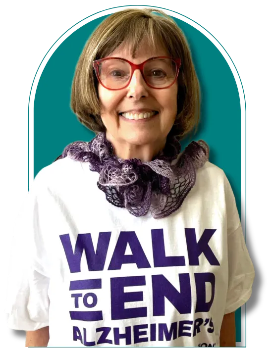 woman wearing a white t-shirt with print walk to end alzheimer
