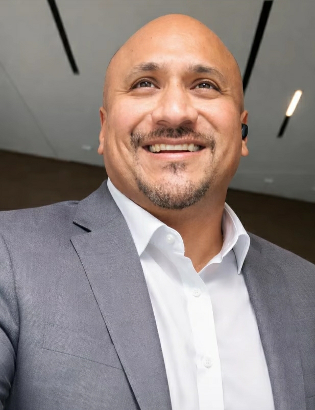 man wearing watch with black suit