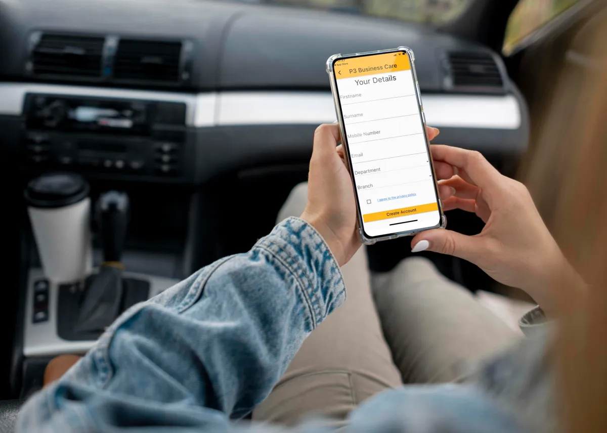 A person looking at p3 app in a car