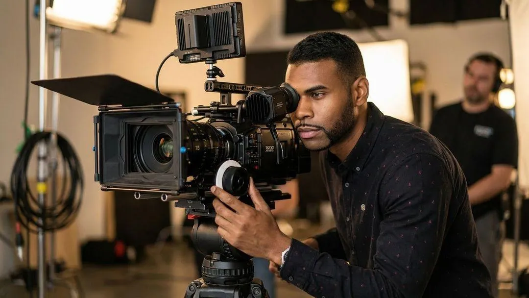 Small business owner recording educational video with a learner-focused setup