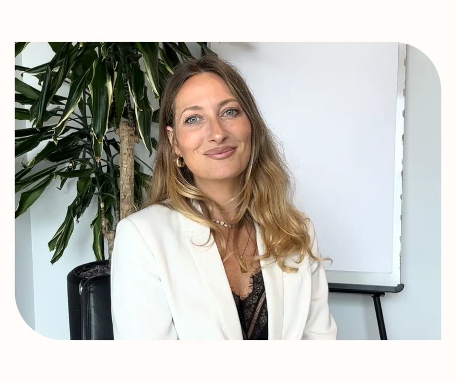 Integrative health coach Irene Fogale sitting calmly, representing stress management and balanced lifestyle coaching