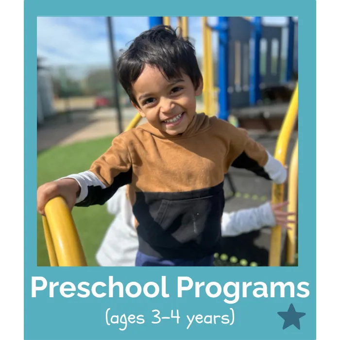 Preschool child playing in outdoor playground facilities