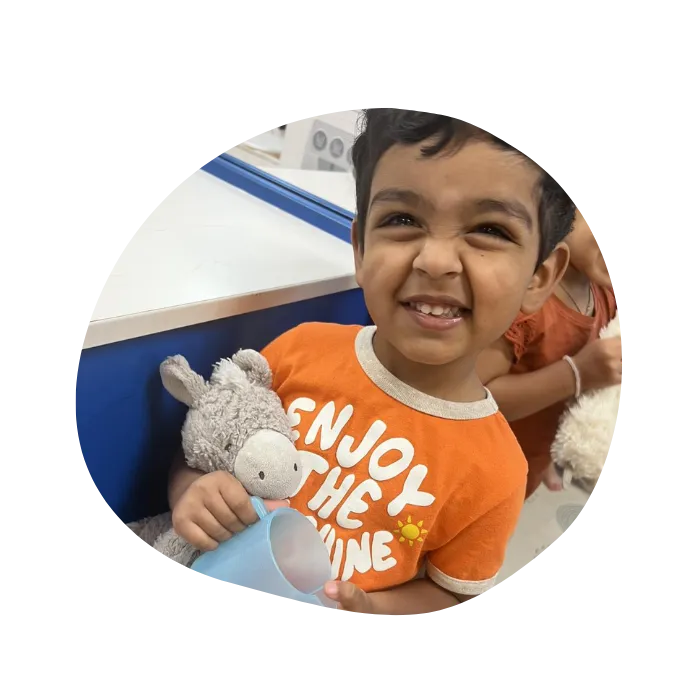 preschool child playing with toys in childcare facility