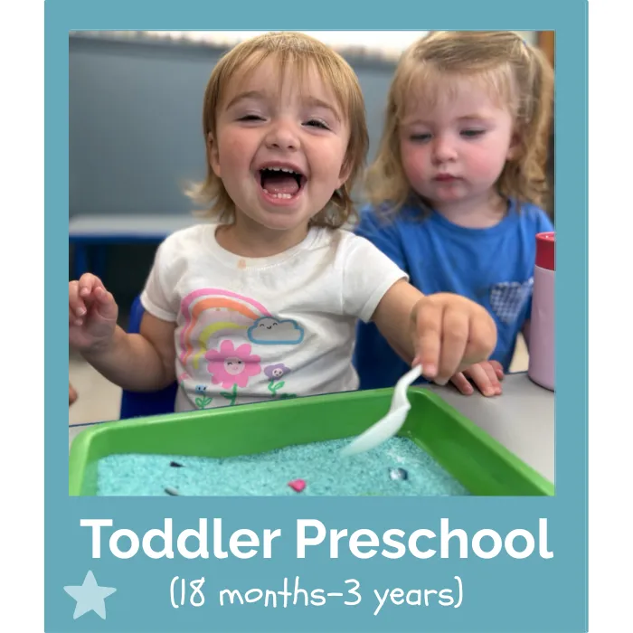 toddlers playing with sensory toys in a safe childcare environment