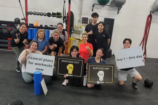 Beginner learning combinations at a first kickboxing class at Fight Fitness Markham
