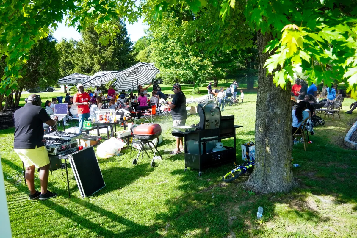 A modern and stylish barbershop interior is featured.