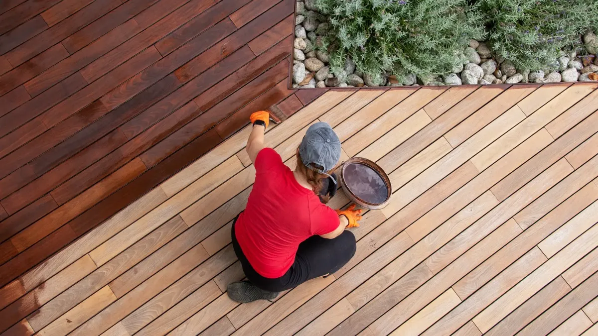 is it better to stain or paint a deck
