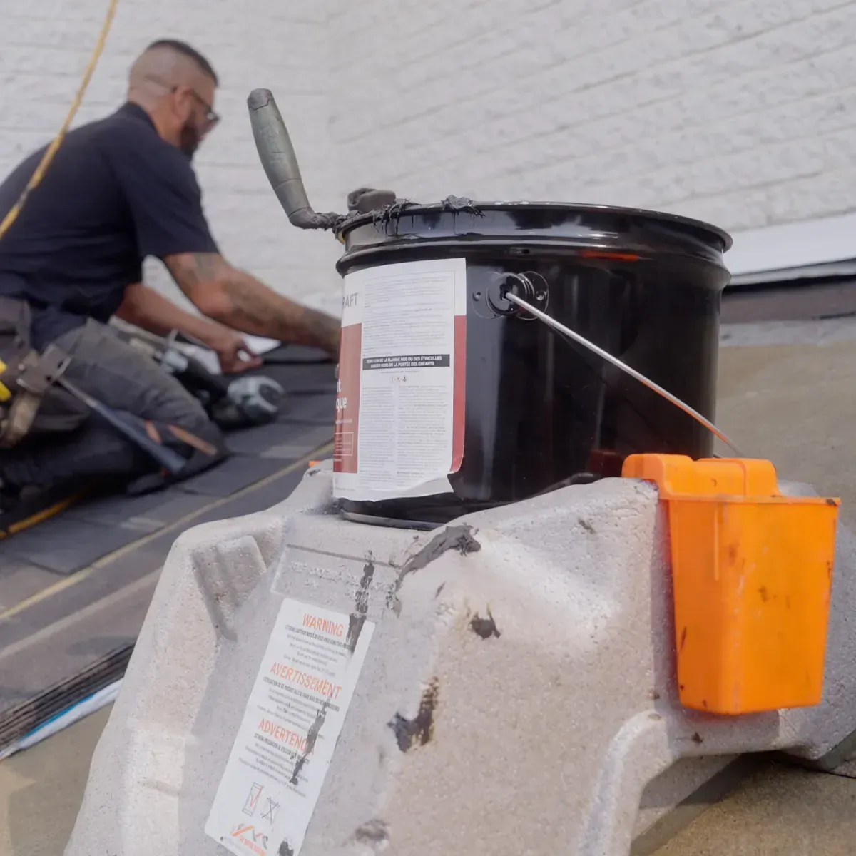 BMF Roofing Solutions pail anchor in use with roofer