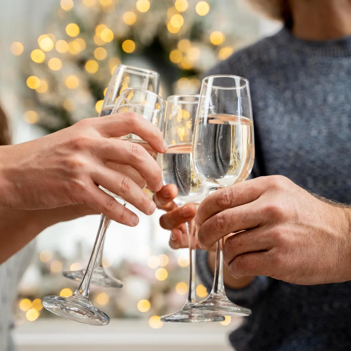 pic of people holding glasses filled with champagne