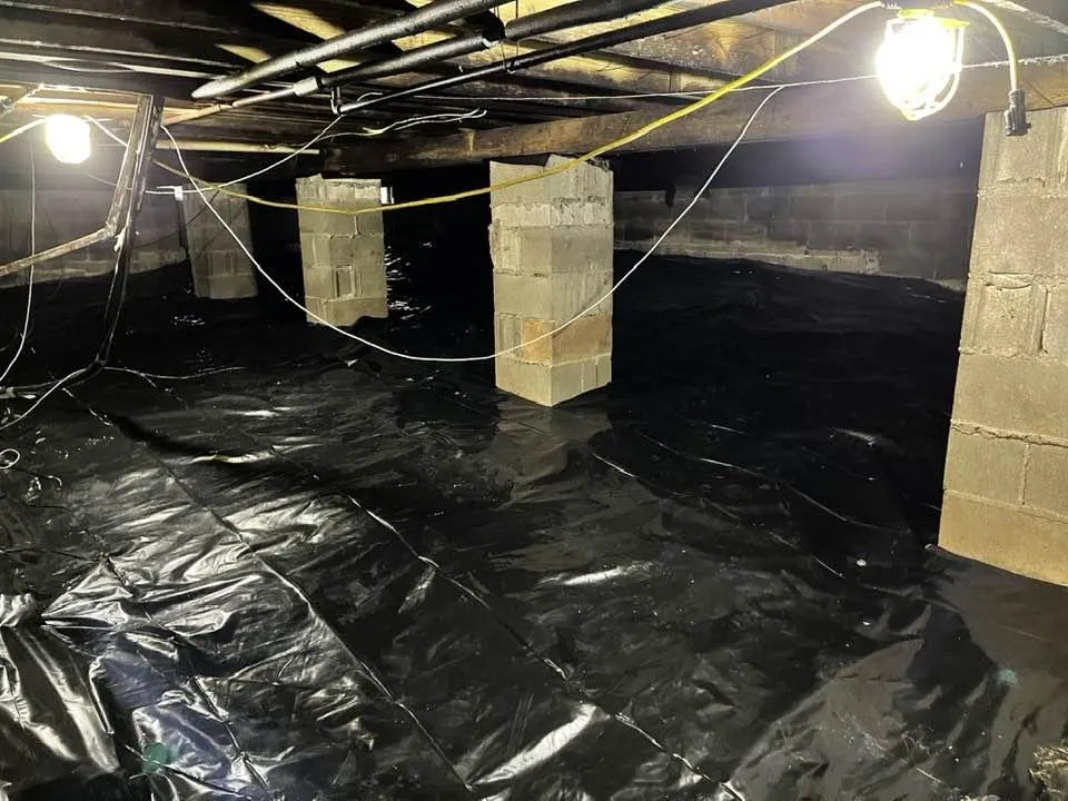 Image illustrating pier support installation by Crawlspace Fixers