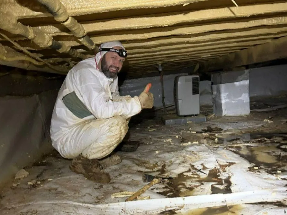 Crawl Space Fixers Technician inspecting Arkansas crawlspace.