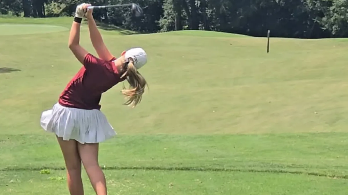 One of our female personal training clients and athletes at 4Balance Fitness on the golf course